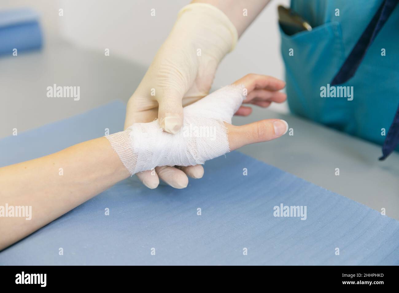 A doctor wrapped around the wrist for first aid closeup. Application