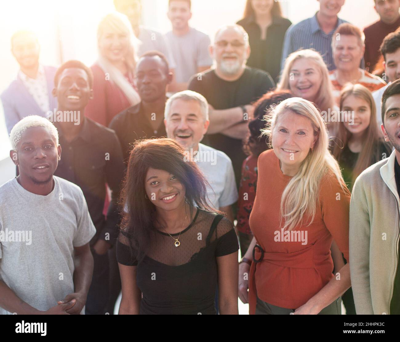 Group of business people smiling in an office Stock Photo