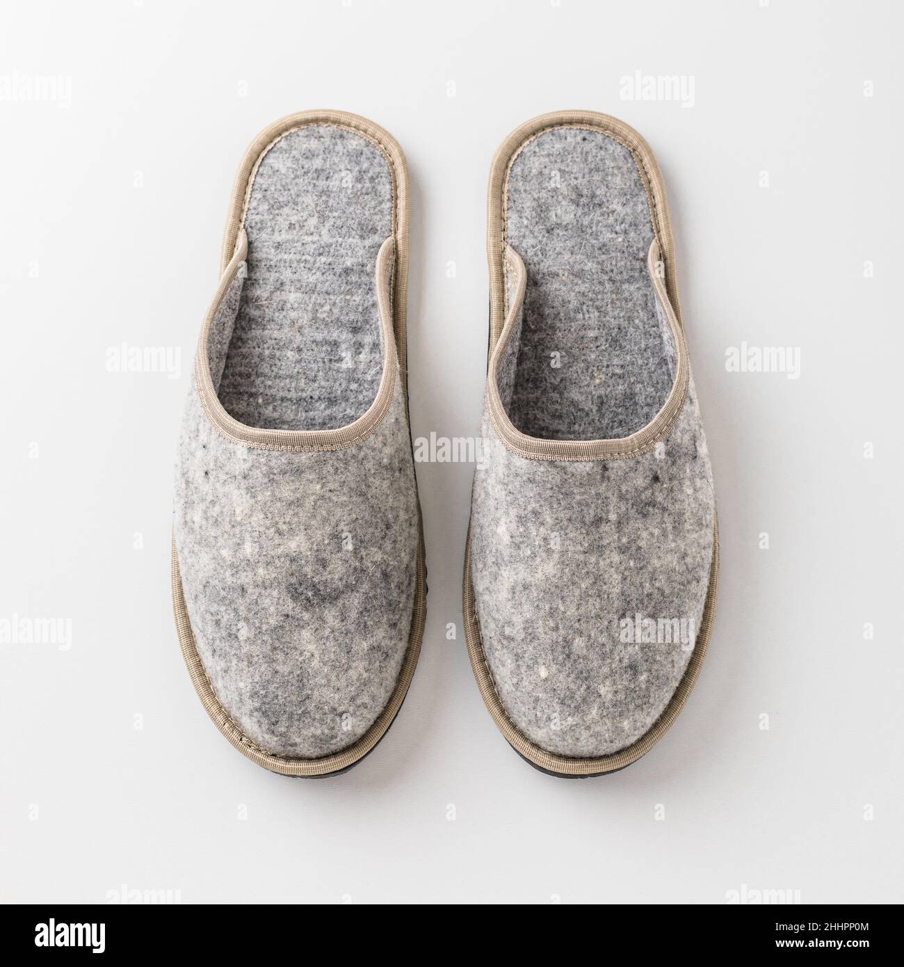 Men's felt slippers. Home shoes made of felted wool Stock Photo - Alamy