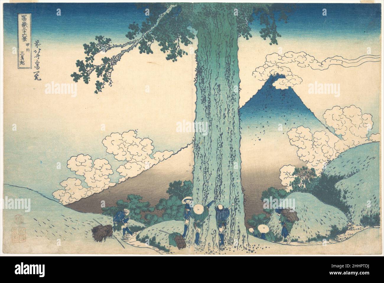 Mishima Pass in Kai Province (Kōshū Mishima goe), from the series Thirty-six Views of Mount Fuji (Fugaku sanjūrokkei) ca. 1830–32 Katsushika Hokusai Japanese Expressing their exuberance and triumph at having reached the site of the ancient cryptomeria tree, three travelers embrace its enormous trunk. The contrast of the small human figures with the enormous natural forms reveals Hokusai's empathy with the pilgrims.. Mishima Pass in Kai Province (Kōshū Mishima goe), from the series Thirty-six Views of Mount Fuji (Fugaku sanjūrokkei)  56786 Stock Photo
