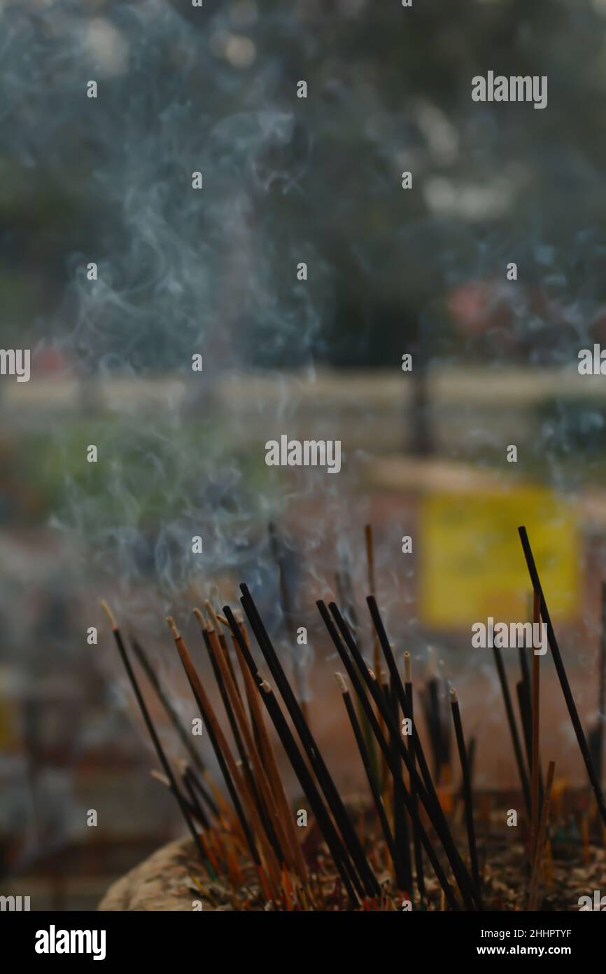 Scented incense sticks burning in temple area Stock Photo Alamy