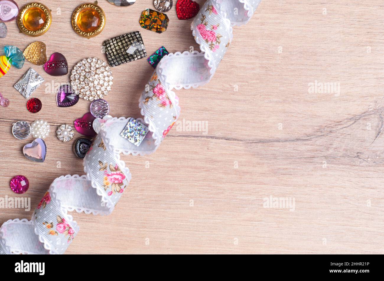 multi-colored sewn stones on a grey background.Copy Space Stock Photo
