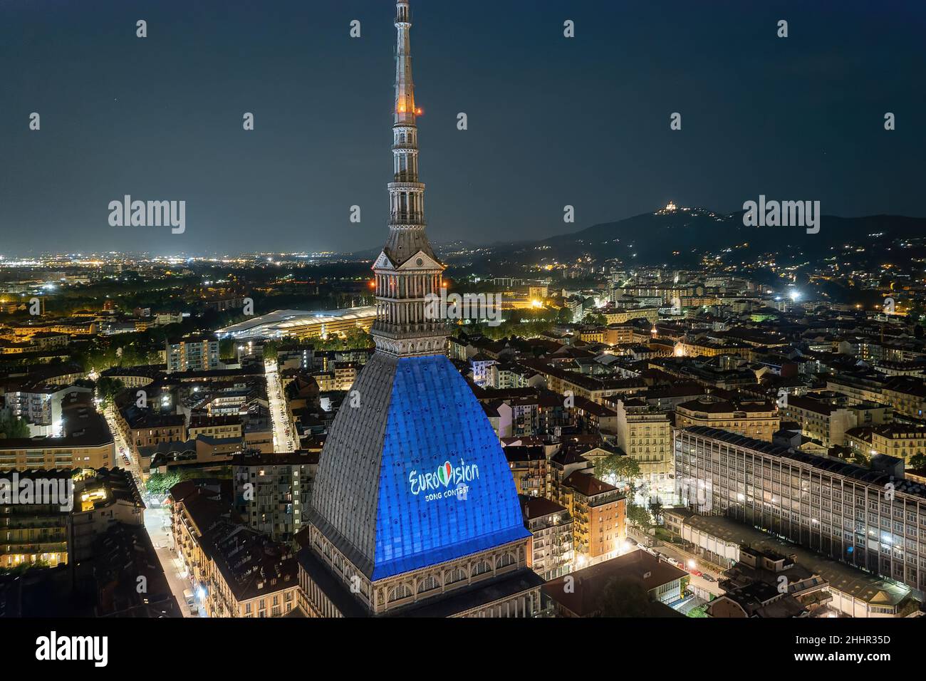 Eurovision Song Contest logo projected on the Mole Antonelliana. The 66th edition will be held in Turin in May 2022. Turin, Italy - January 2022 Stock Photo
