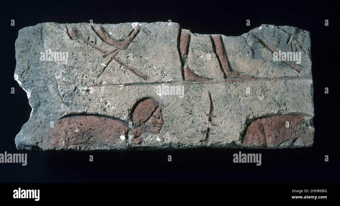 Relief faragment with Nubians ca. 1353–1336 B.C. New Kingdom, Amarna Period. Relief faragment with Nubians. ca. 1353–1336 B.C.. Limestone, paint (mostly original). New Kingdom, Amarna Period. From Egypt; Probably from Middle Egypt, Hermopolis (Ashmunein; Khemenu); Probably originally from Amarna (Akhetaten). Dynasty 18 Stock Photo