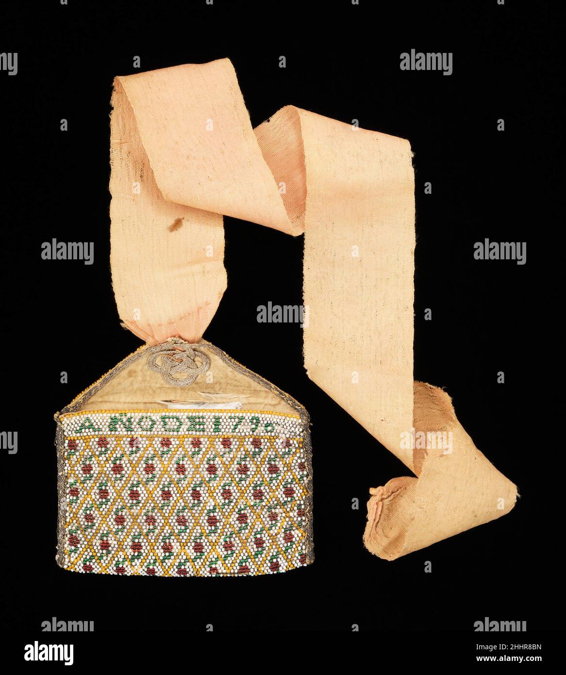 Coin purse 1790 Mexican This coin purse, with its latticework patterning, floral motifs, and