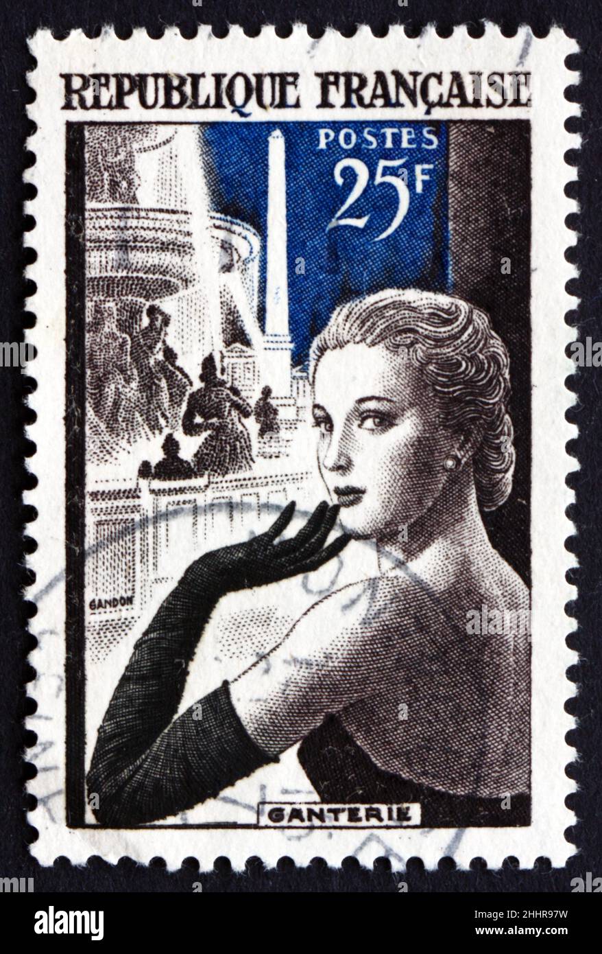 FRANCE - CIRCA 1955: a stamp printed in the France shows Glove Model in Place de la Concorde, Paris, French Glove Manufacturing, circa 1955 Stock Photo