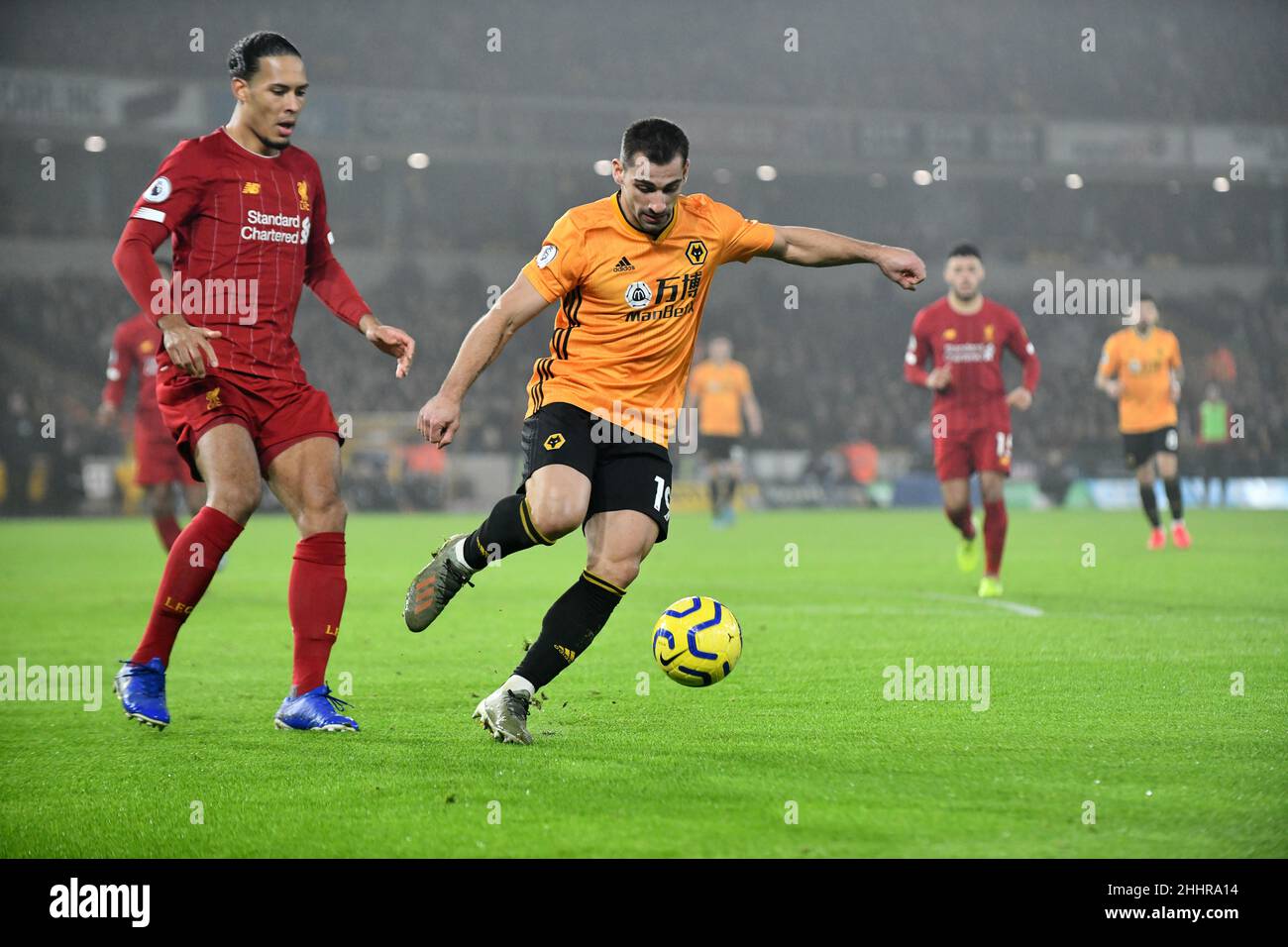 Wolves footballer Jonny Otto and Virgil Van Dijk of Liverpool ...