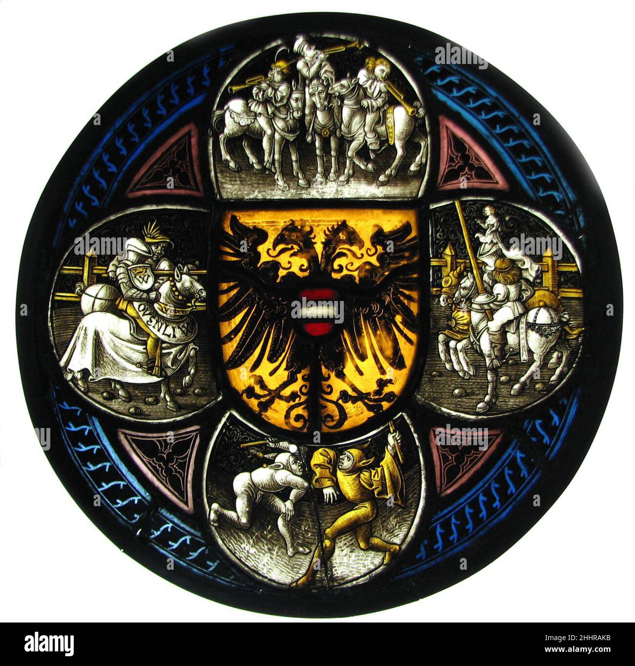 Quatrefoil Roundel with Arms and Secular Scenes 1490–1500 German In the center of this panel are the imperial arms of Austria. The scenes in the quatrefoil represent a variety of secular vignettes. These scenes may signify a tournament masquerade of the type held in Nuremberg before Lent, which would explain the presence of fools, feasts, and lovers. Such imagery was understood as social satire in late medieval art. The number of similar quatrefoil panels that have survived suggests considerable popularity. The origin of the designs is uncertain, but many copies and variations were made in sev Stock Photo