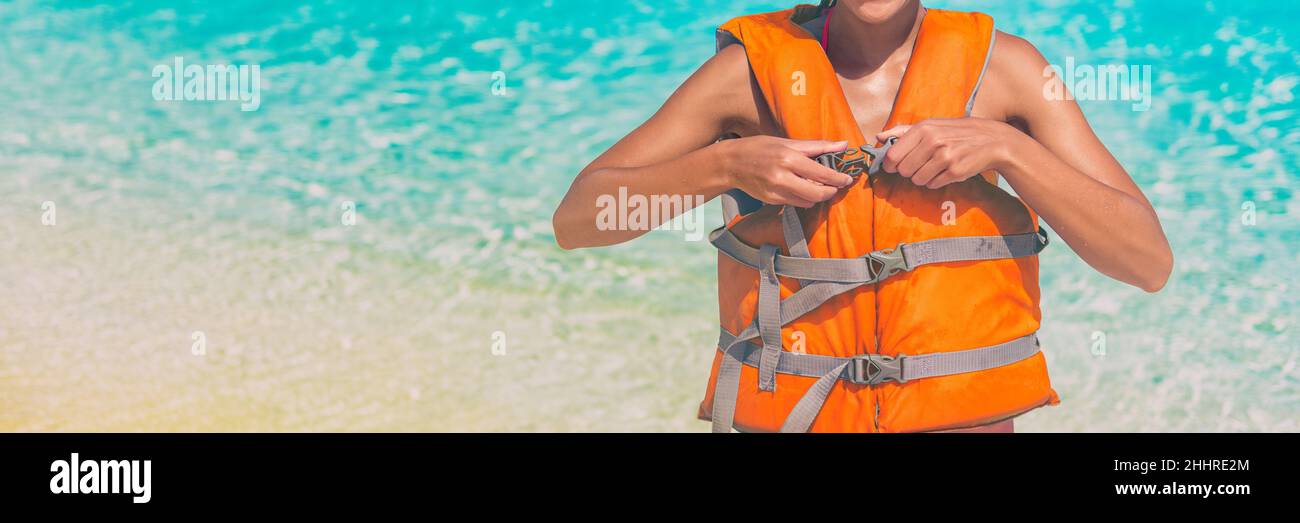 Woman wearing lifejacket hi-res stock photography and images - Alamy