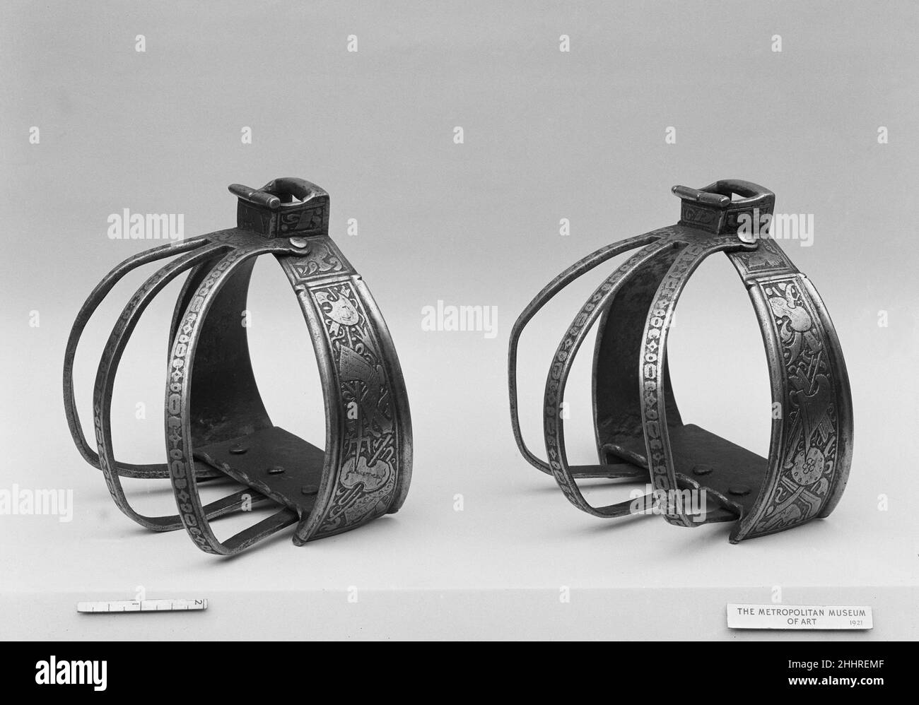 Pair of Stirrups from a Horse Armor Made for a Member of the Collalto Family ca. 1560 Italian, probably Milan These stirrups belong to a horse armor (acc. no. 21.139.2), dating from about 1560, which is one of the few complete examples of its period to be preserved. It comes from the armory of the counts Collalto at the castle of San Salvatore, near Treviso, where it was presumably kept from the late sixteenth until the early twentieth century. The bands of etched ornament include classically inspired trophies of arms and armor and musical instruments. These were standard decorative motifs on Stock Photo