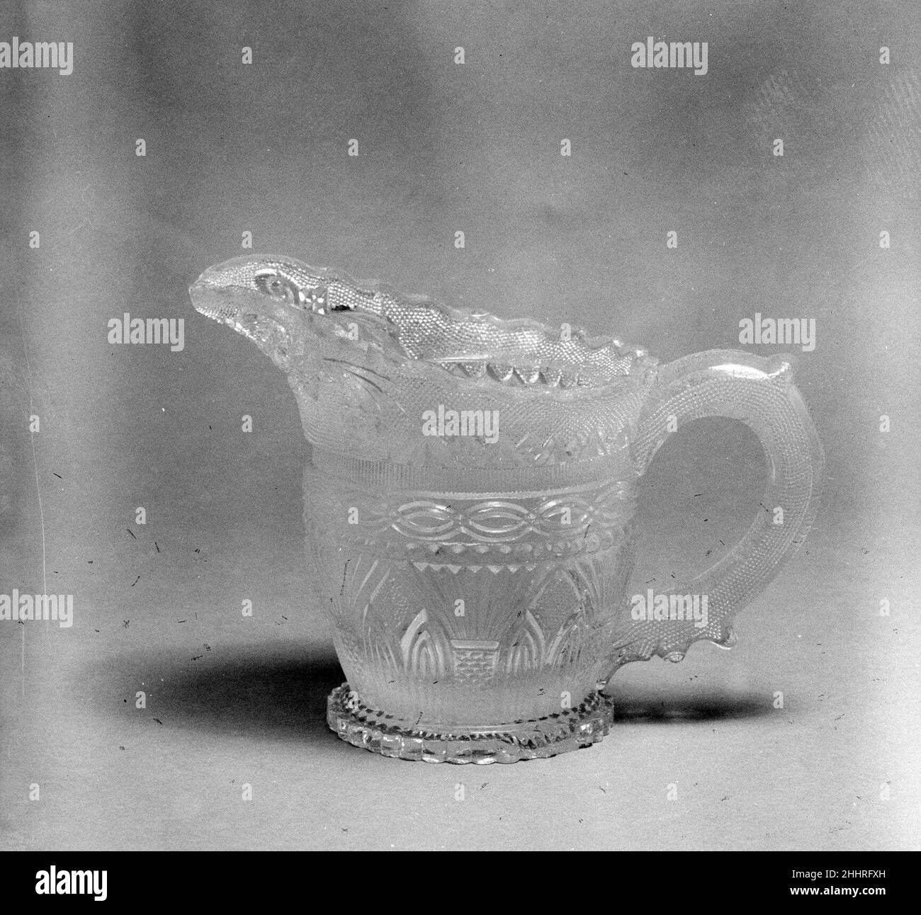 Creamer 183040 American. Creamer. American. 183040. Lacy pressed