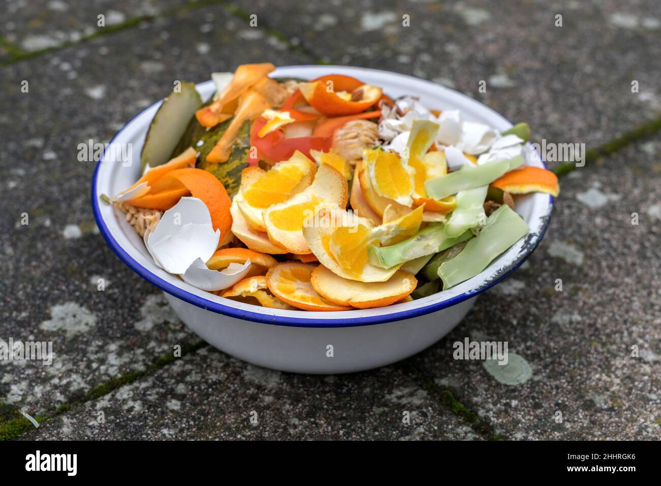 White bowl with organic waste Stock Photo