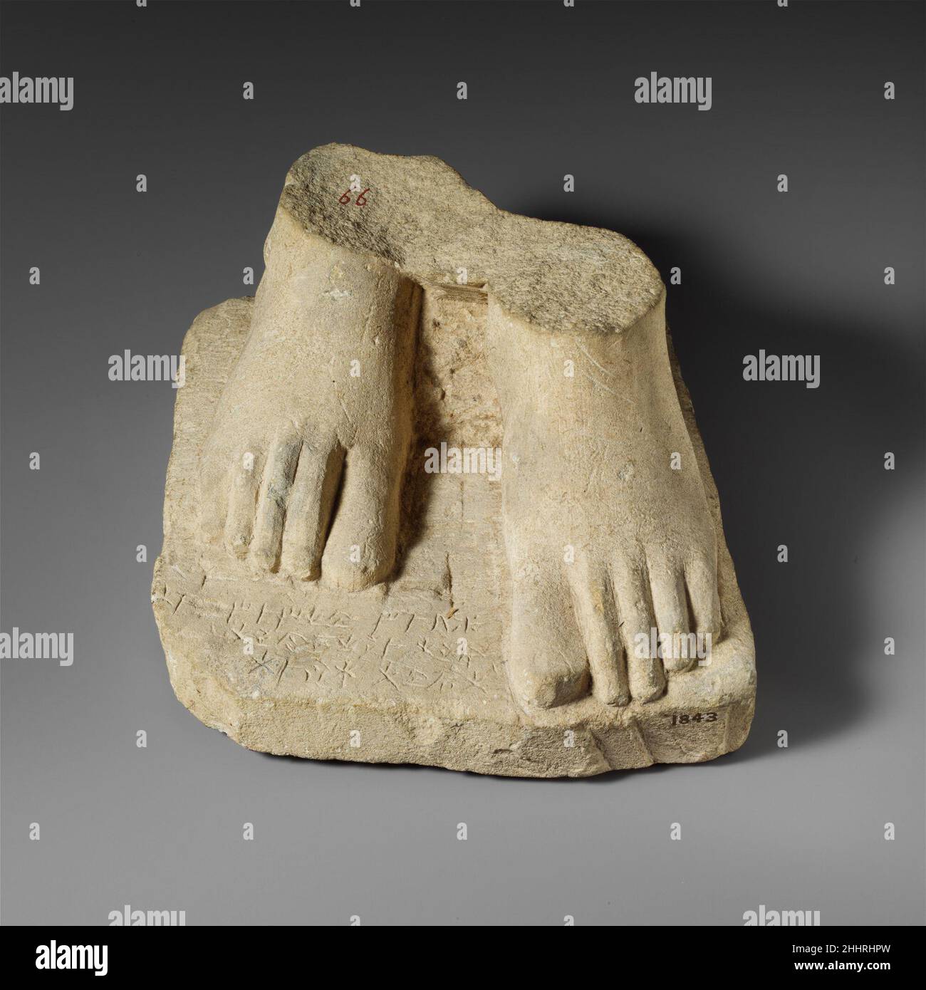 Limestone plinth with the feet of a male statuette mid- or 2nd half of ...