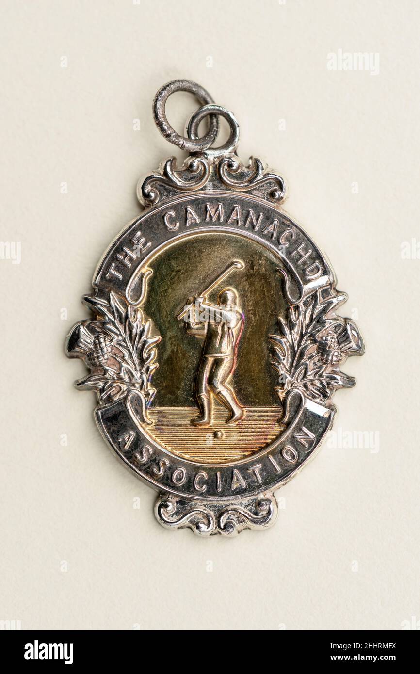 Camanachd Cup Winners Medal. Shinty's blue ribbon trophy, played for each season, and this is an image of the traditional winners medal. Stock Photo
