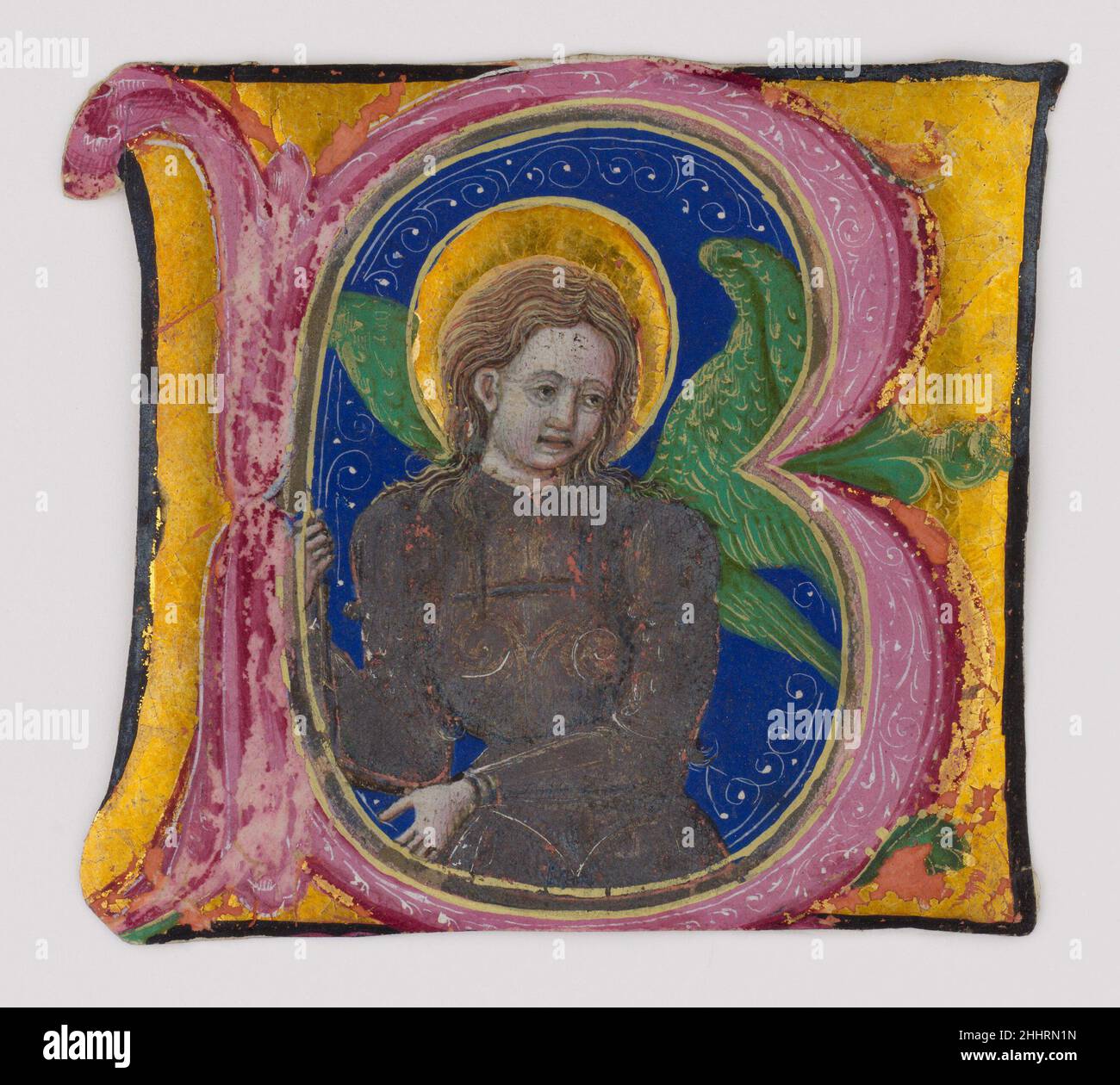 Manuscript Leaf Cutting from a Choir Book with an Illuminated Initial B and the Archangel Michael second half of the 15th century Italian. Manuscript Leaf Cutting from a Choir Book with an Illuminated Initial B and the Archangel Michael  32839 Stock Photo