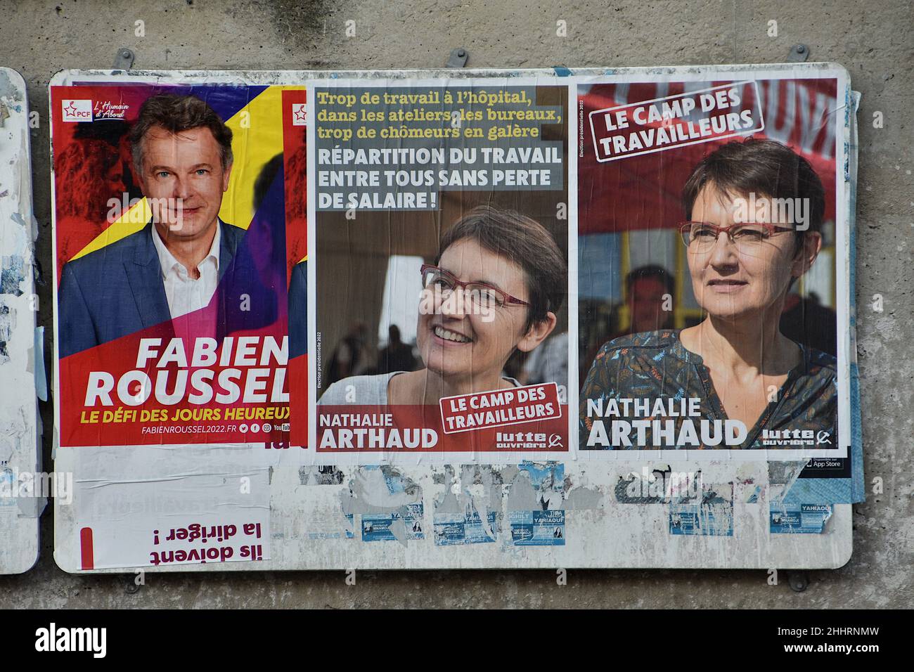 Marseille, France. 25th Jan, 2022. Posters of Fabien Roussel (L) and Nathalie Arthaud (R) are seen on display.Posters campaign of Nathalie Arthaud, Fabien Roussel, Philippe Poutou and Jean-Luc Mélenchon, candidates for the French presidential elections of 2022. Credit: SOPA Images Limited/Alamy Live News Stock Photo