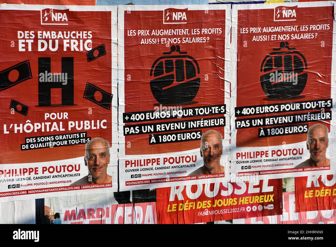 Marseille, France. 25th Jan, 2022. Posters of Philippe Poutou are seen on display.Posters campaign of Nathalie Arthaud, Fabien Roussel, Philippe Poutou and Jean-Luc Mélenchon, candidates for the French presidential elections of 2022. Credit: SOPA Images Limited/Alamy Live News Stock Photo