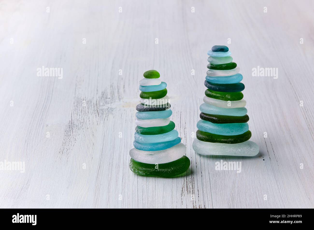 Balance of glass sea stones. Meditation and relaxation Stock Photo - Alamy