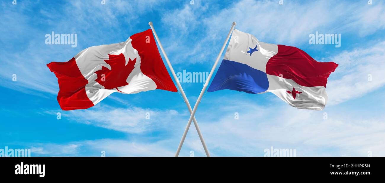 crossed national flags of Canada and Panama flag waving in the wind at ...