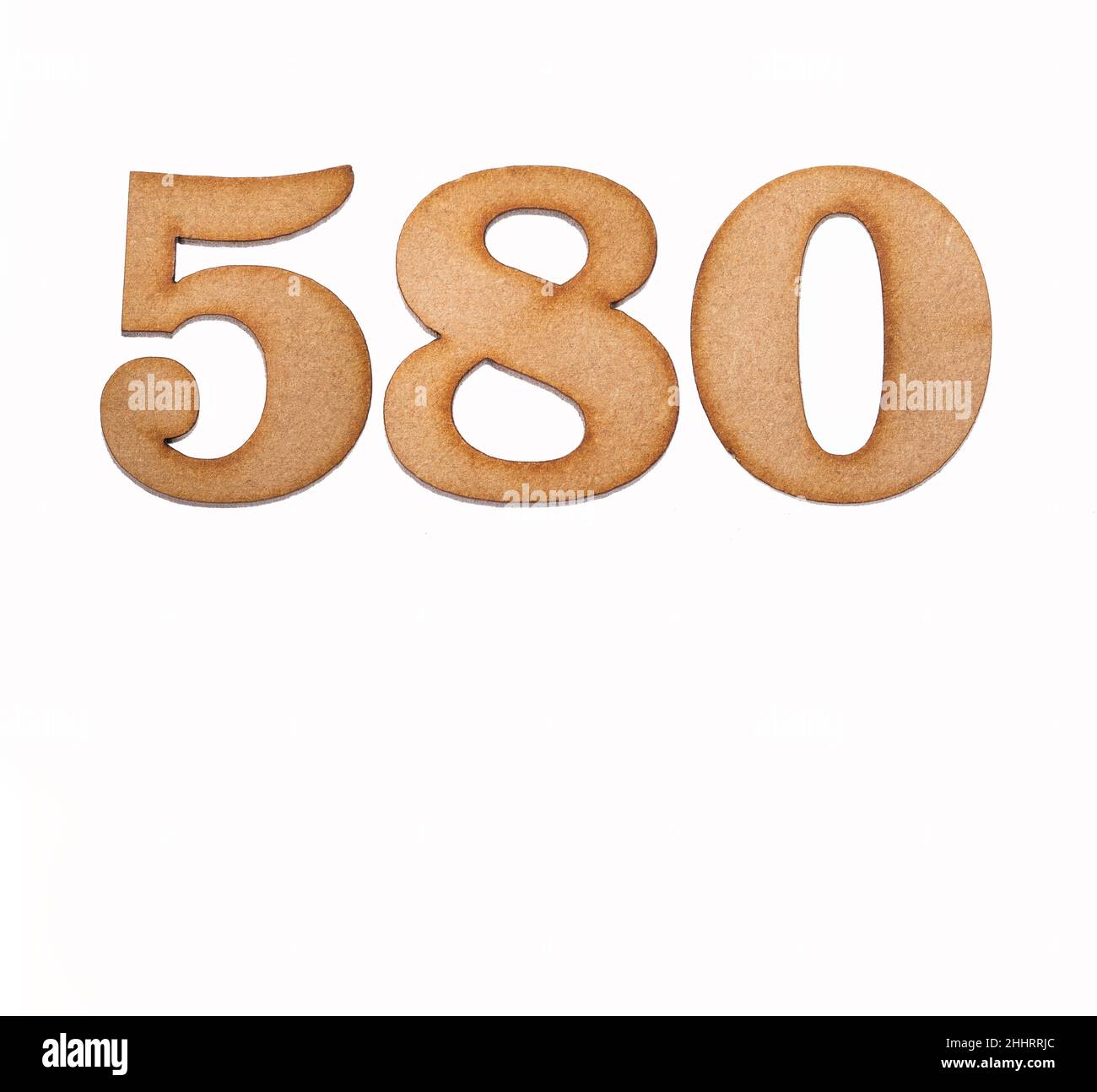 Number 580 - Piece of wood isolated on white background Stock Photo - Alamy