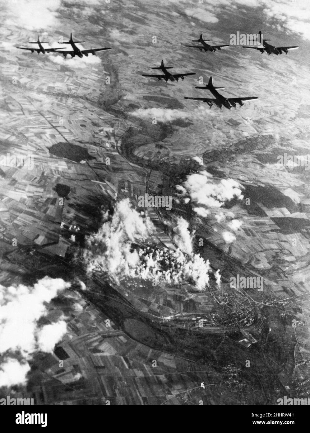 Aerial view of B17 Fortress bombers of the US 8th Air Force plastering another Nazi fighter base at the Amiens-Glisy aerodrome in Northern France at the end of a month that saw the Anglo-American air offensive mount to yet greater intensity.The Flying Fortresses are targeting the factories building German fighters and the fields from which they fly as the Allied Air Forces hit harder at the Luftwaffe to gain the completely supremacy int he air on the Western Front that was a prelude to invasion on the Italian front. September 1943. Stock Photo