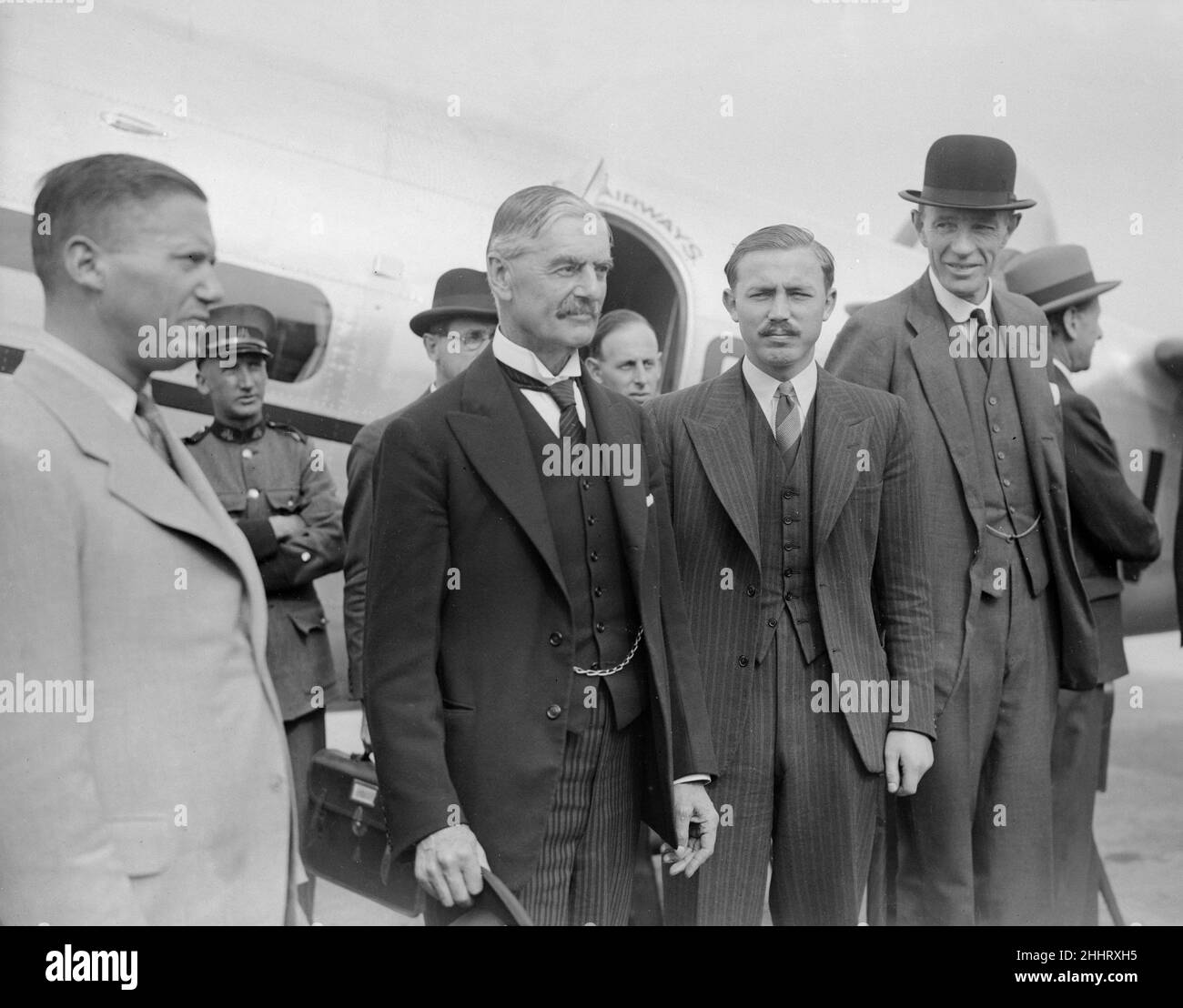 British Prime Minister Neville Chamberlain at Heston airport for a meeting with German Chancellor Adolf Hitler in Munich. 15th September 1938. Stock Photo