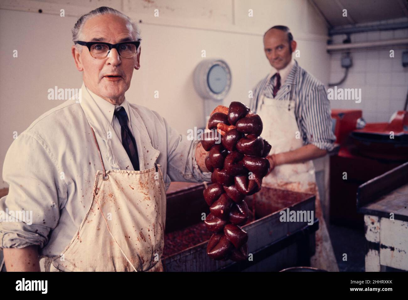 Award winning black puddings being made by Albert Hirst (died 1982) and George Hirst (not a relative) in the Queens Road, Barnsley, factory in 1976. Stock Photo