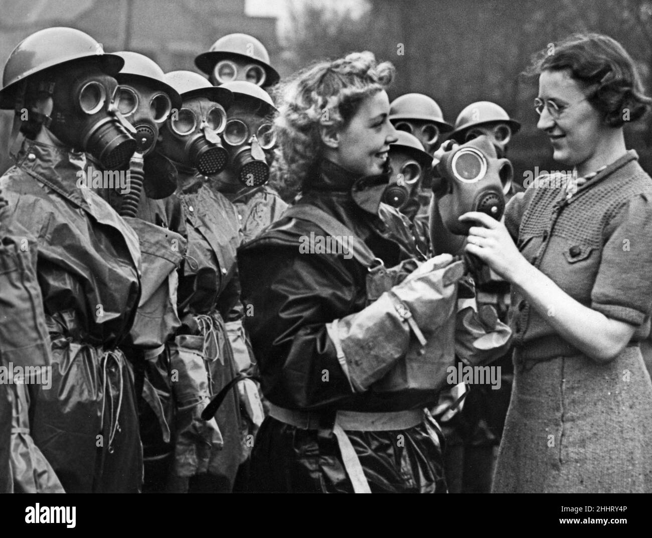 Merseyside ARP team seen here wearing their gas suits and masks. 8th December 1938 Stock Photo