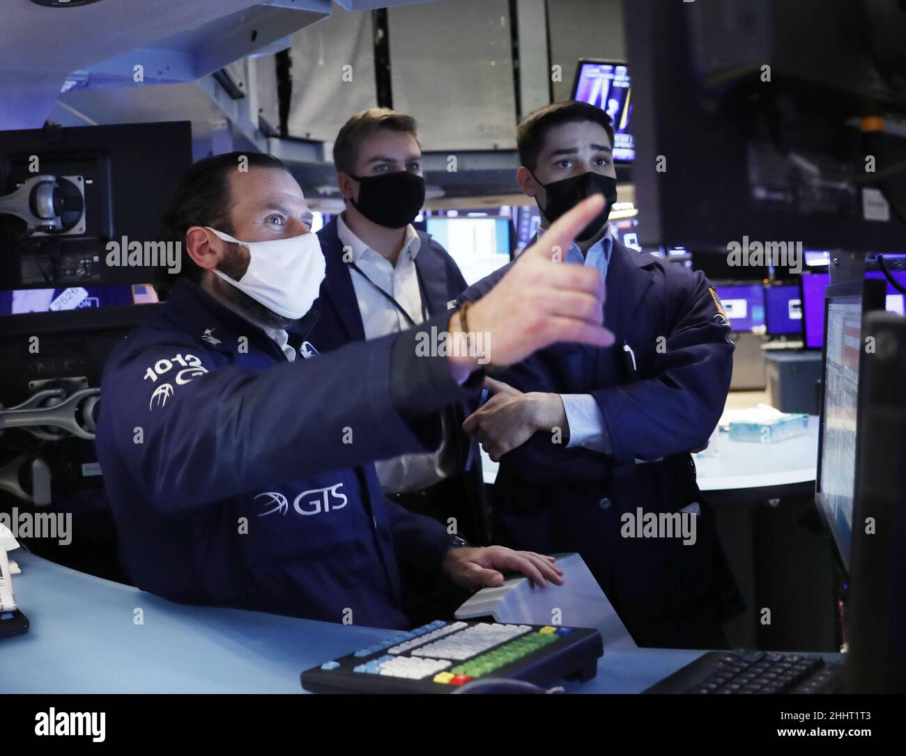 New York, United States. 25th Jan, 2022. Traders work on the floor of the NYSE before the closing bell at the New York Stock Exchange on Wall Street in New York City on Tuesday, January 25, 2022. One day after one of the biggest market comebacks history, Stocks again bounced back from early huge losses on the day. Photo by John Angelillo/UPI Credit: UPI/Alamy Live News Stock Photo