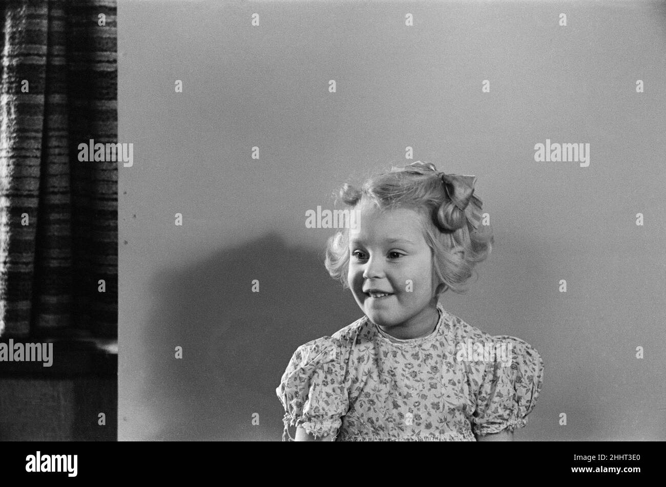 A portrait of a young girl, Ella Edwards. 1940. Stock Photo