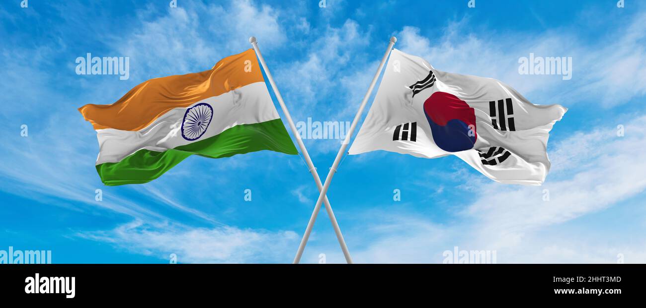 crossed national flags of India and south korea flag waving in the wind ...