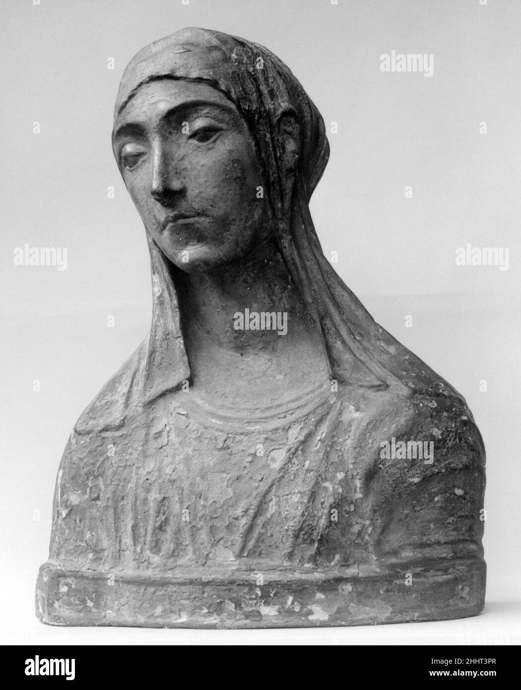 Virgin Mary (probably) late 15th century After a composition by Mino da Fiesole (Mino di Giovanni) Italian After a composition by Mino da Fiesole represented by a marble in the National Gallery of Art, Washington.. Virgin Mary (probably). After a composition by Mino da Fiesole (Mino di Giovanni) (Italian, Papiano or Montemignaio 1429–1484 Florence). Italian, Florence or Rome. late 15th century. Stucco, polychromed. Sculpture Stock Photo