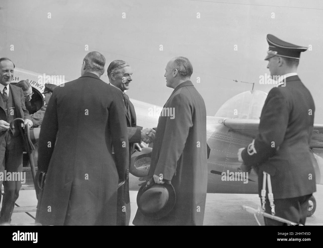 British Prime Minister Neville Chamberlain greeted by German Foreign Minister Joachim Von Ribbentrop on his arrival in Munich, for one a meeting with German Chancellor Adolf Hitler. 15th September 1938. Stock Photo