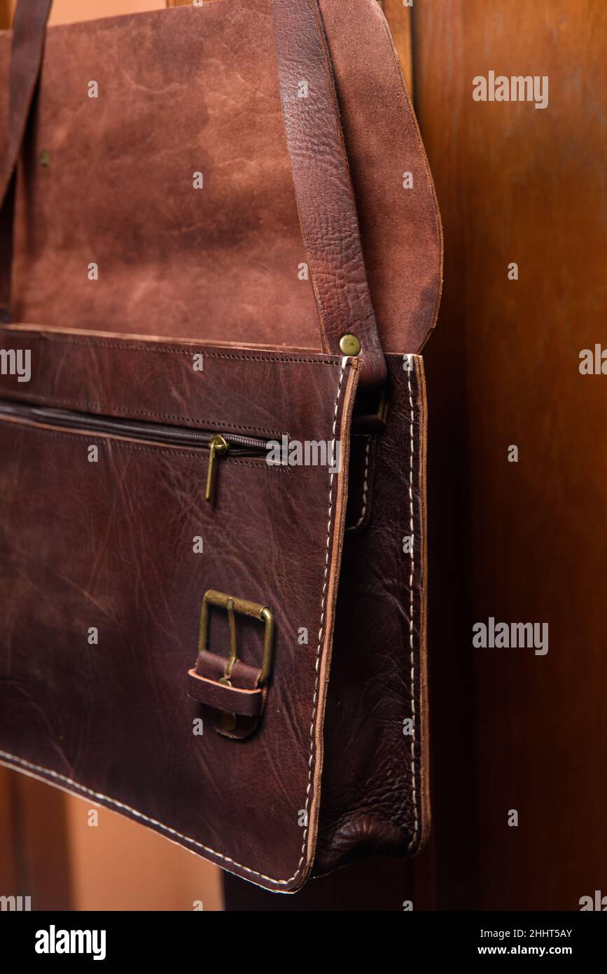 Open brown leather briefcase with antique and retro look for man on a ...