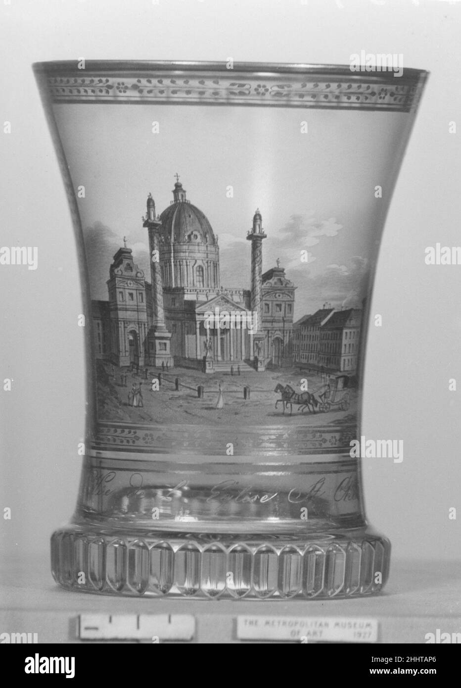 Beaker with view of the Karlskirche, Vienna ca. 1820–30 Anton Kothgasser Austrian View of the Karlskirche, or Church of Saint Charles Borromeo (Vienna) in bright transparent enamel; the identifying inscription below implies that the beaker was meant for French-speaking visitors to Vienna.. Beaker with view of the Karlskirche, Vienna. Austrian, Vienna. ca. 1820–30. Glass, enameled and gilt. Glass Stock Photo