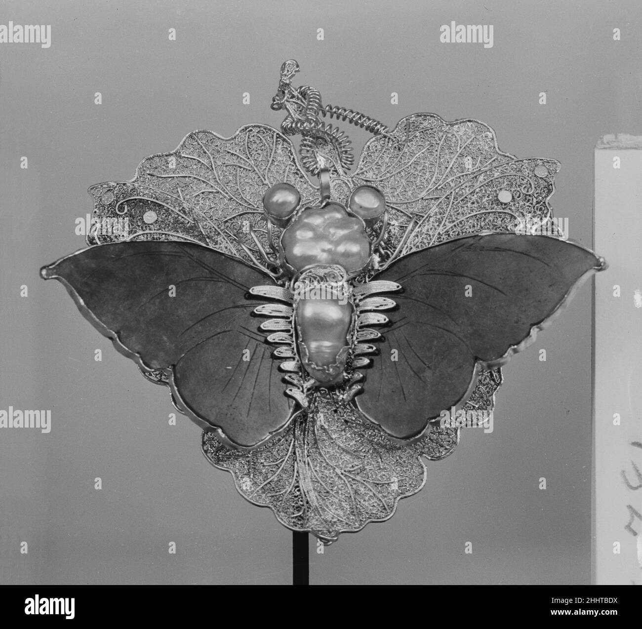 Butterfly 18th century China. Butterfly. China. 18th century. Jadeite, pearl, gold filigree. Jade Stock Photo