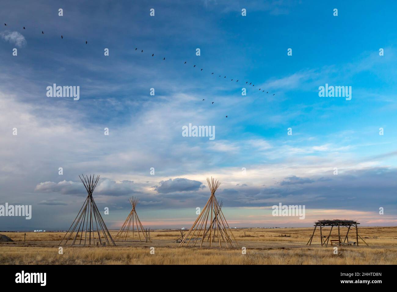 Aurora, Colorado - A tipi camp at the Plains Conservation Center. The Center is an 1100-acre remnant prairie preserve, with the tipi camp and a sod ho Stock Photo