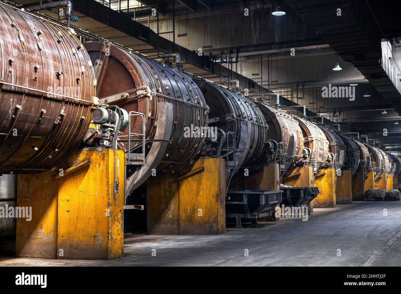 Large wooden barrels for the tanning of cattle leather Stock Photo