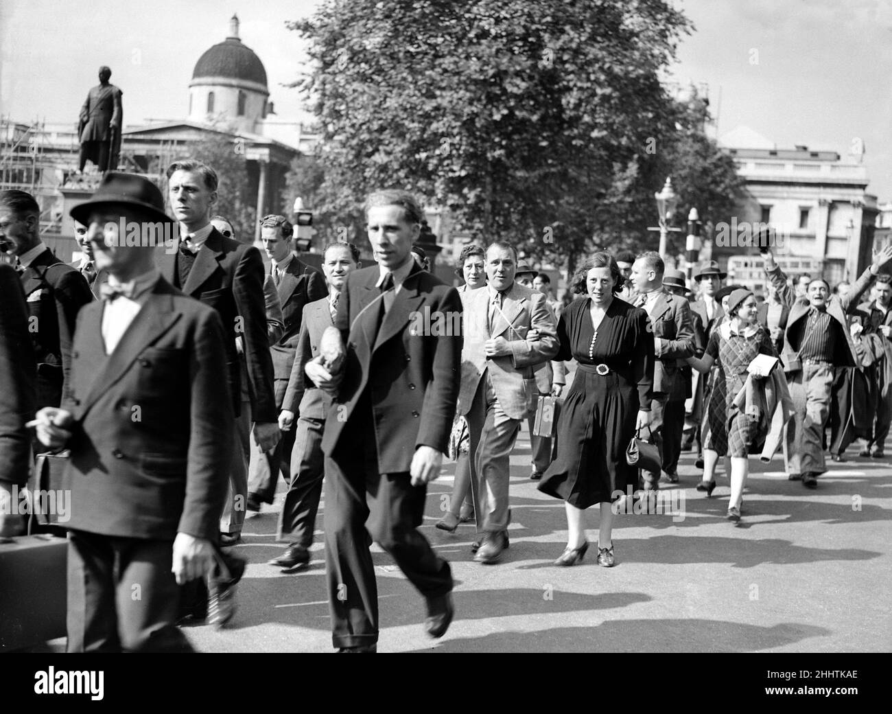 3rd September 1939, Large crowds seen here in Trafalgar Square making their way to Downing Street, Whitehall and the Houses of Parliament as the zero hour 11am approached which was the time limit for the ultimatum to Germany to expired. Prime Minister Neville Chamberlain announced shortly after 11 that Great Britian had declared war on Germany following the Nazi refusal to retreat from Poland Stock Photo