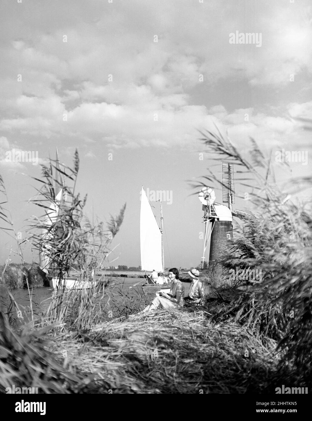 Where some of the happiest ship companies afloat are to be found - Whitsun on the Norfolk Broads near Potter Heigham. Circa 1940 Stock Photo