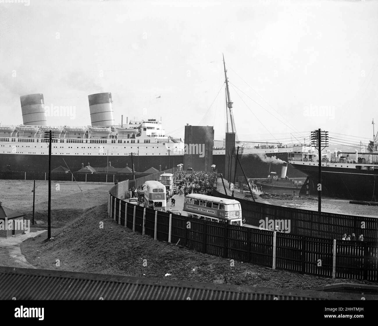 The RMS Mauretania brought up the Thames to King George V Dock at Woolwich.  She is the biggest ship to ever come up the Thames to unload her cargo. 6th August 1939. Stock Photo