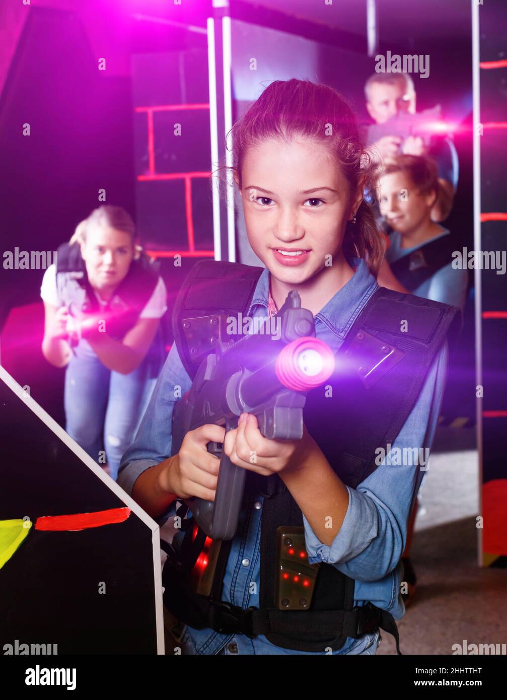 Portrait of teenager girl with laser gun having fun with her fam Stock Photo Alamy