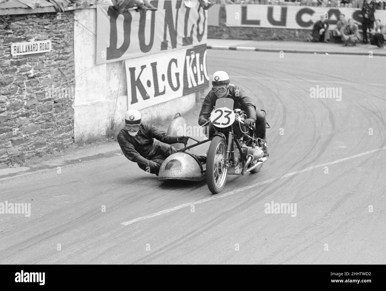 Motorcycle Racing Isle of Man TT Races June 1954 P S W Noll and his partner speed round Parkfield Corner in the side car race during the Tourist Trophy races on the Island. Stock Photo