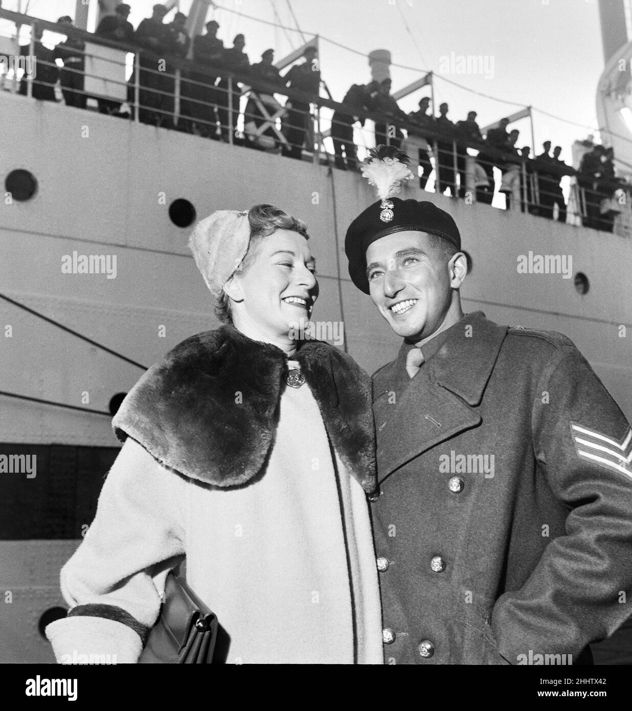 Sergeant David Sharp of the Royal Northumberland Fusiliers, the last British Prisoner of War to be released from Korea, is greeted by his mother Sadie on arrival in Southampton.26th October 1953. Stock Photo