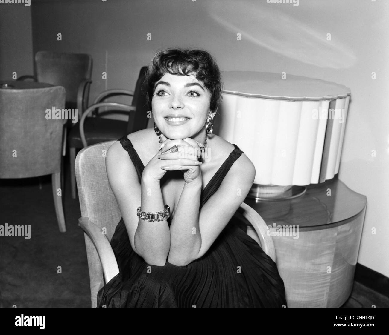 Joan Collins, actress, pictured at home, with family and friends, London, 4th October 1955. Stock Photo