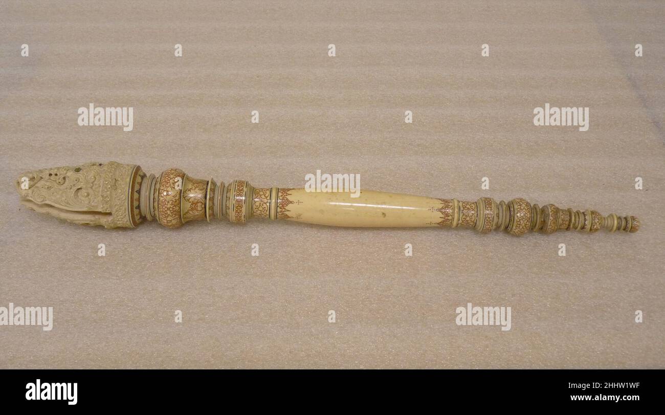Fan (Chauri) Handle and Finial 18th century Sri Lanka (Kandy district) Buddhist devotees presented high-quality ivory fans of this type to revered monks.. Fan (Chauri) Handle and Finial. Sri Lanka (Kandy district). 18th century. Ivory with engraved and painted design. Kandyan period (1480–1815). Ivories Stock Photo