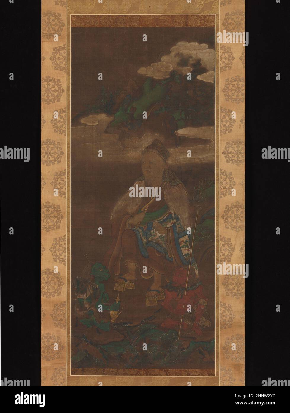 Portrait of En no Gyōja late 14th–15th century Attributed to Jakusai 寂済 Japanese The legendary founder of a sect of mountain-dwelling religious practitioners called Shugendō, En no Gyōja is said to have lived during the seventh century on Mount Katsuragi, near the ancient capital of Nara. He is believed to have conjured Zaō Gongen of Mount Kinpusen, the guardian deity of Shugendō.In this portrait, En no Gyōja appears in his conventional hood, monk’s robe, straw mantle, and wood sandals. He is usually shown holding a vajra (thunderbolt sword) and a shakujō (jeweled staff with six rings); here, Stock Photo