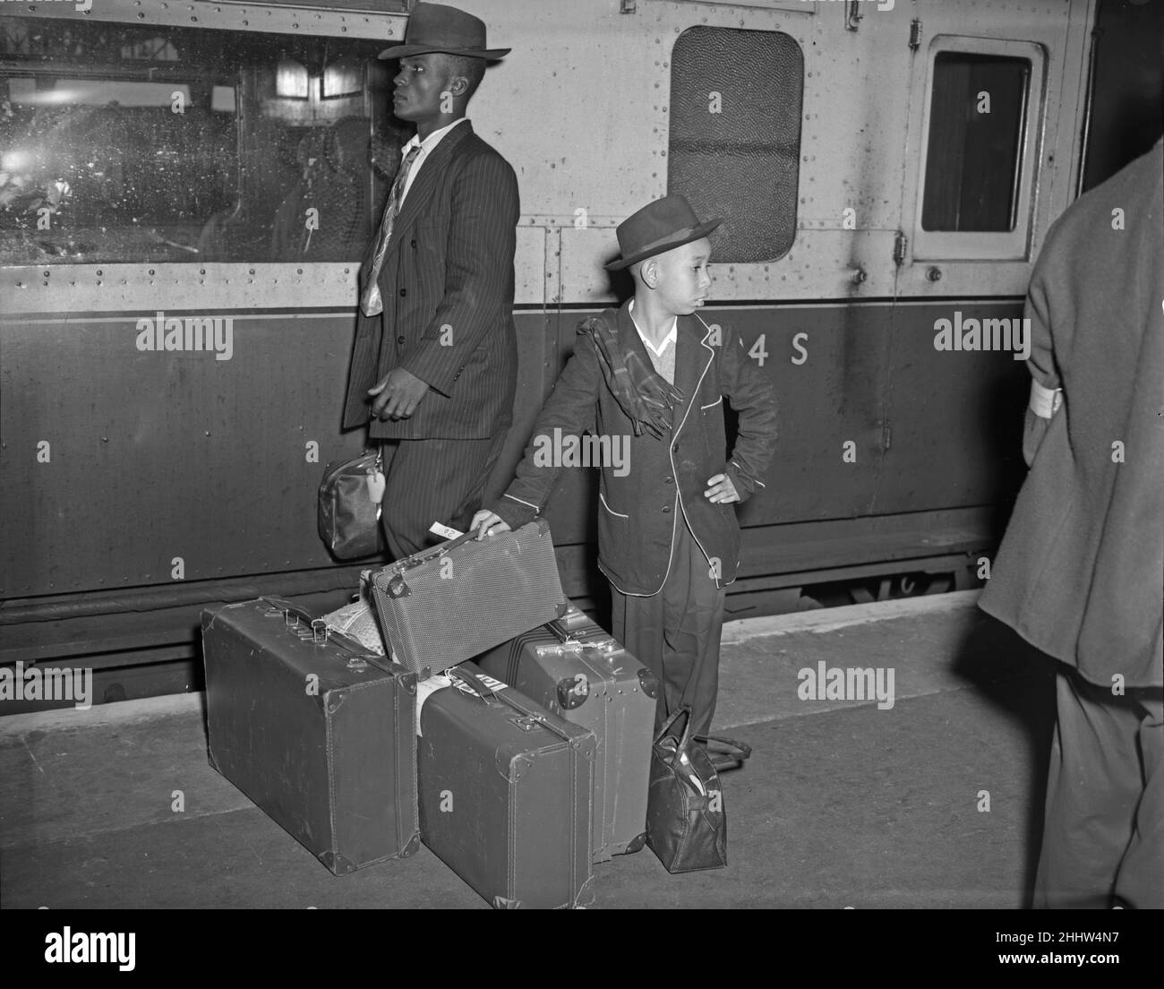Jamaican emigrants arriving at Waterloo Station 22nd September 1954A train load of hopes  reached London when nearly 700 Jamaicans arrived In search of work. Most of the arrivals were men. Many said they had work to go to. or relatives to live with. Half of them plan to stay in London. The rest are bound for the Midlands and the North. Since the beginning of the year (1954) more than 6,000 Jamaicans have arrived in Britain. Stock Photo