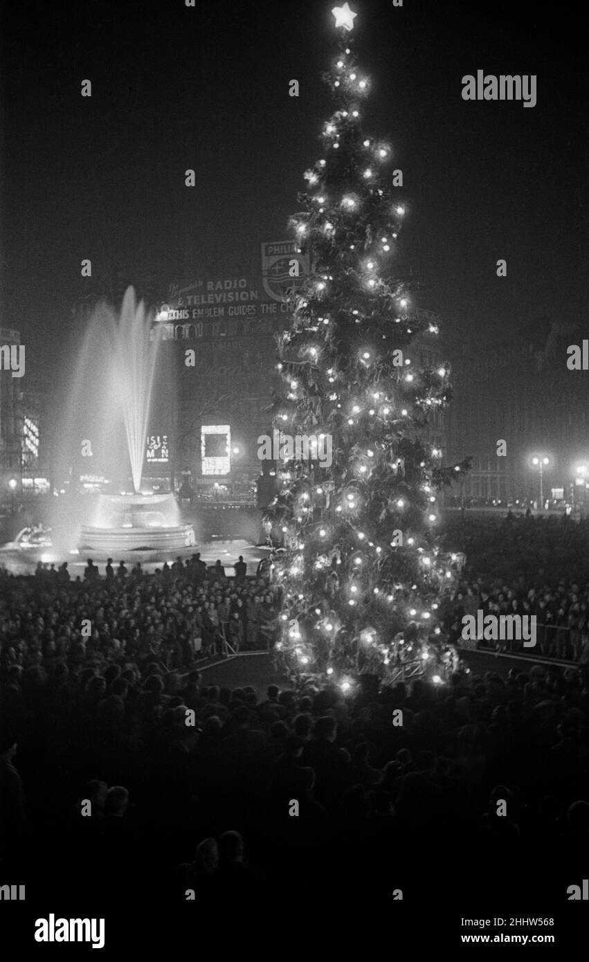 Carol singing around the Christmas Tree in Trafalgar Square, London