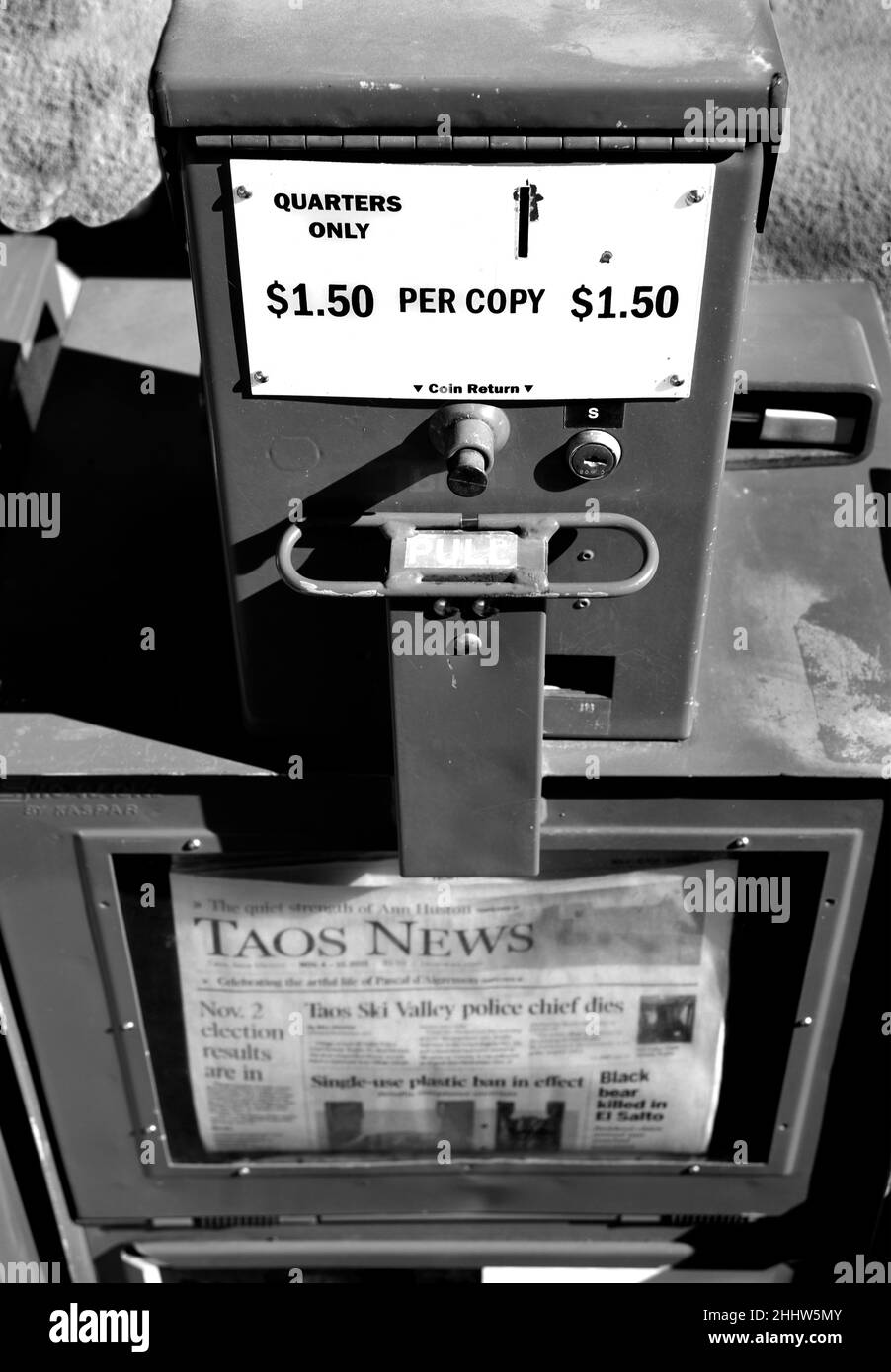 A coinoperated newspaper vending machine in Taos, New Mexico Stock Photo Alamy
